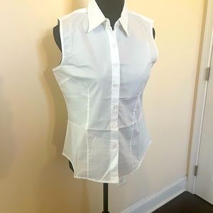 White sleeveless collar shirt with buttons, size large. Fits like a small.
